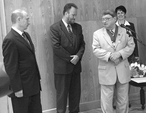 С В.Путиным во время награждения